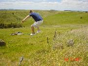Here is a good one of me jumping over a rusty old fence.  In order to get to the old car in the background I had to make it over this fence somehow.  
